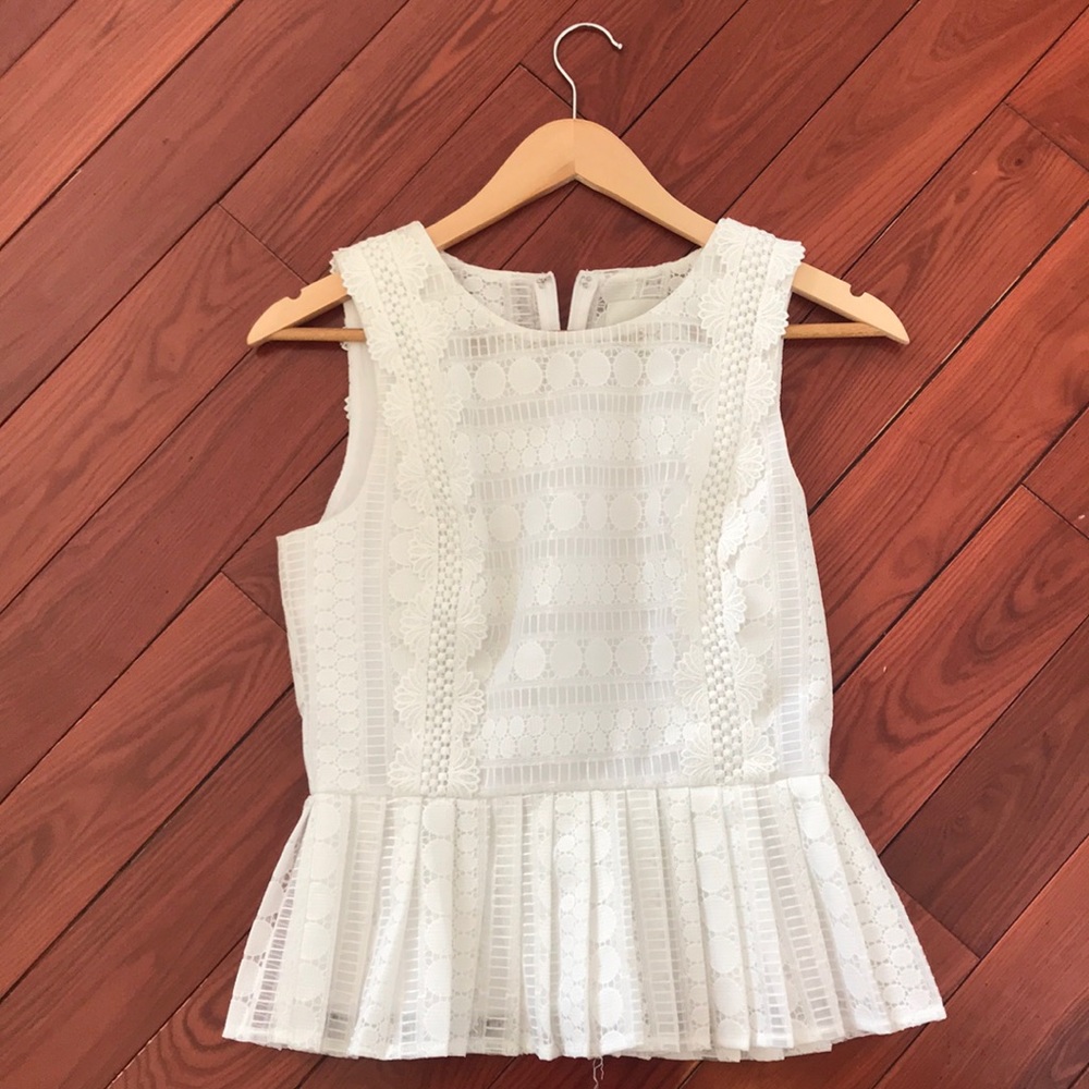 White sleeveless blouse